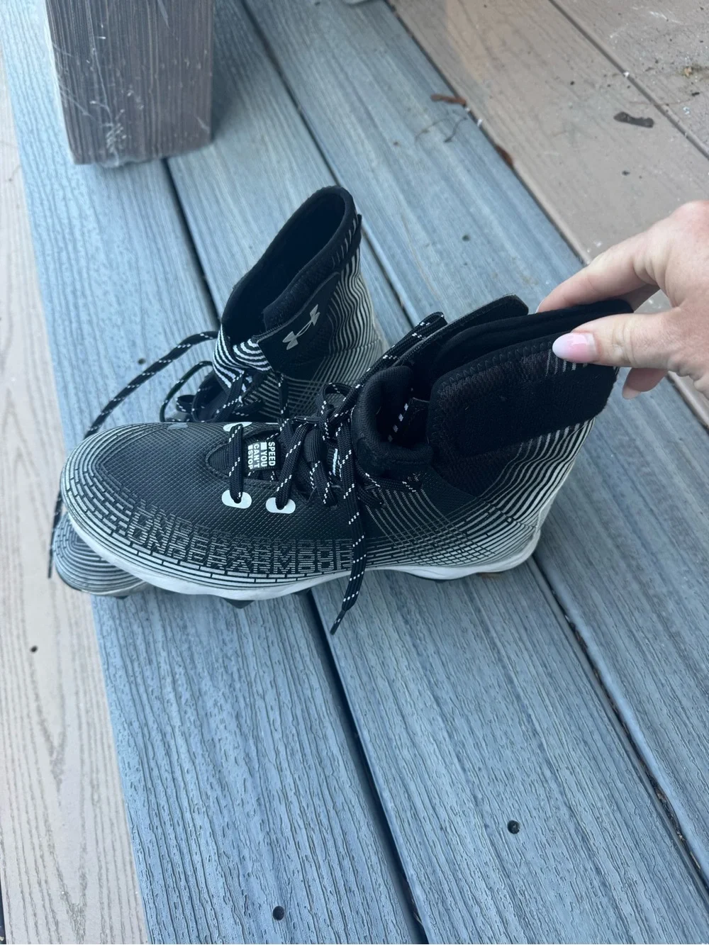 Under Armour Men’s Black and White High-Top Athletic Cleats